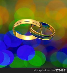 Interlocked golden rings on the blurry background