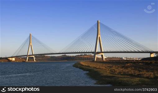 international bridge view north. international bridge in the Guadiana river between spain and portugal