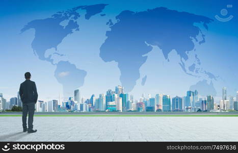 International business concept with businessman on city skyline background with map double exposure