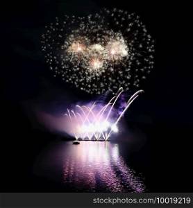 International competition of fireworks over the water surface. Brno Dam-Czech Republic-Brno. Beautiful colorful abstract fireworks. Concept for celebrations and holidays.