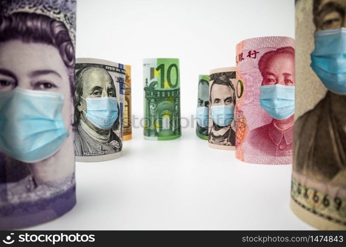 International currency money include US American Dollar, Euro Currency, British UK Pound, Australian Dollar, China Yuan and Japan Yen face mask concept of coronavirus disease COVID-19 economic crisis.