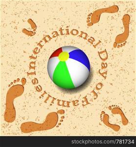 International Day of Families. Concept of a family of 4 people - father, mother, daughter, baby - their footprints on the beach and a bright ball. International Day of Families