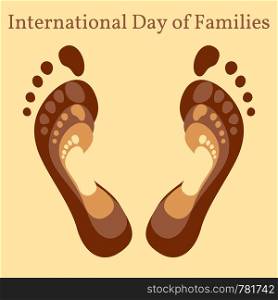 International Day of Families. Concept of a family of 4 people - father, mother, daughter, baby - their footprints on each other. International Day of Families