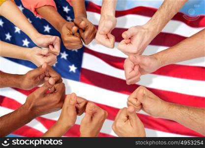 international, diversity, patriotism, ethnicity and people concept - hands showing thumbs up over american flag background. hands of international people showing thumbs up