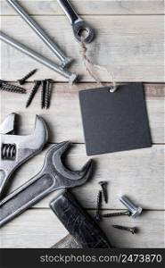 International Father&rsquo;s Day. Greeting card. Work tools on a gray wooden background.. International Father&rsquo;s Day. Greeting card. Work tools on a gray wooden background