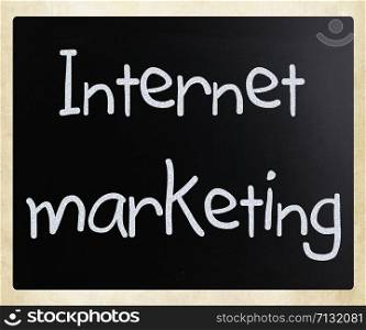 ""Internet marketing" handwritten with white chalk on a blackboard"