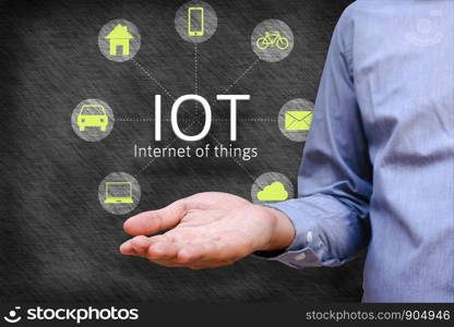 Internet of things (IoT) concept. Man show iot link network and symbol connected with icons