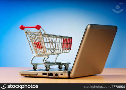 Internet online shopping concept with computer and cart