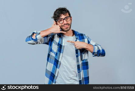 Interpreter man gesturing CALL ME in sign language. Person gesturing CALL ME in sign language, Young man gesturing CALL ME in sign language. Manual gestures of people with hearing problems