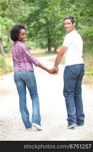 Interracial couple going for a walk