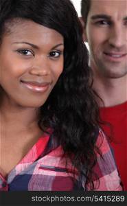 Interracial couple smiling