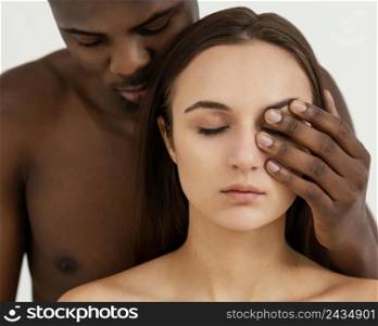 interracial people with closed eyes
