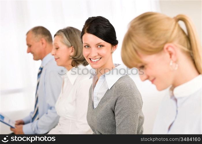 Interview applicants business people waiting young woman smiling
