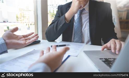 Interview the job and hiring, men candidate at job interview explaining about his profile to business manager in modern office space. Business consulting or employment concept