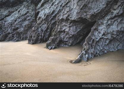 Intimate landscape image of rocks and sand on Broadhaven beach i. Beautiful intimate landscape image of rocks and sand on Broadhaven beach in Pembrokeshire Wales