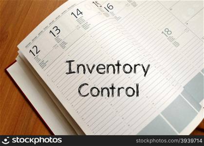 Inventory control text concept write on notebook