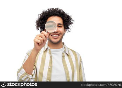 investigation, discovery and vision concept - happy man looking through magnifying glass over white background. happy man looking through magnifying glass