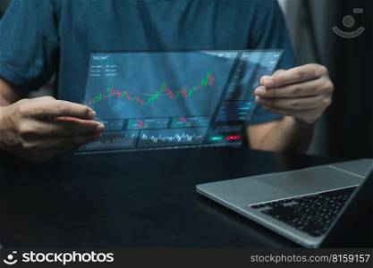 Investment concept and business finance technology Funds for stock market investments and digital assets.businessman analysis financial data from a forex trading graph.