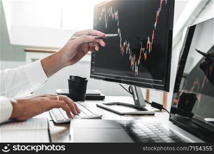 Investment stock market Entrepreneur Business Man discussing and analysis finance market graph stock market trading,stock chart concept
