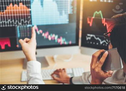 Investment stock market Entrepreneur Business Man discussing and analysis graph stock market trading,stock chart concept