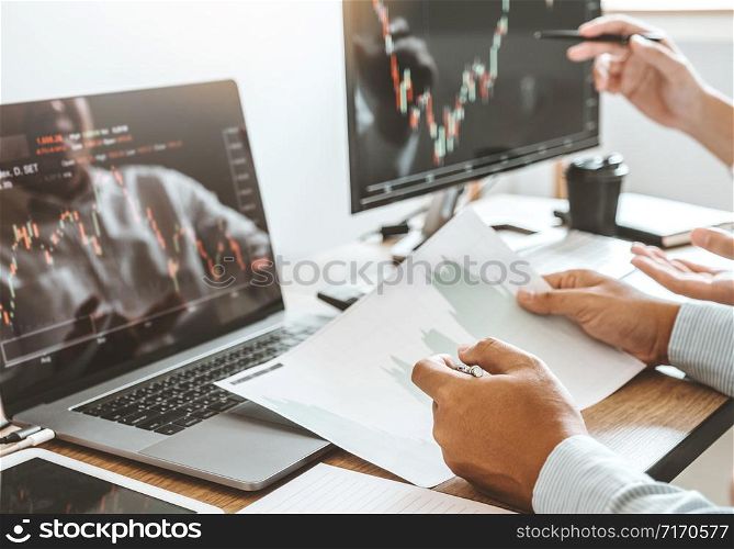 Investment stock market Entrepreneur Business team discussing and analysis graph stock market trading,stock chart concept