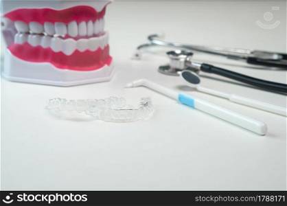 Invisalign braces and tools for dental care, dental healthcare and Orthodontic concept.