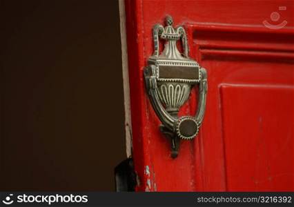 Ireland - Kilkenny - Door knocker on red door