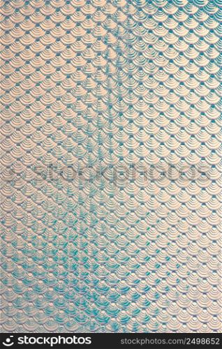 Iridescent holographic mermaid fish scales faux leather texture background.