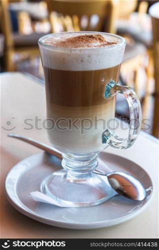 irish coffee cup on a table in cafe
