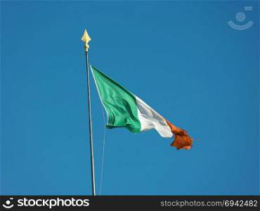 Irish Flag of Ireland over blue sky. the Irish national flag of Ireland, Europe over blue sky