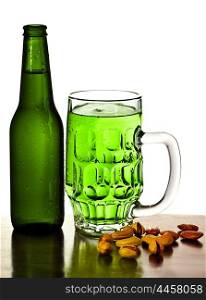 Irish green beer, traditional alcohol for st.Patrick&rsquo;s day holiday celebration, lucky clover beverage, glass with nuts, food and drink still life, isolated on white background