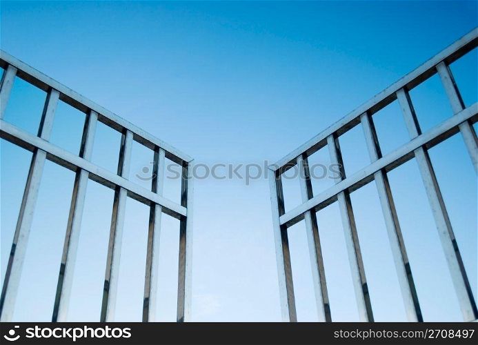 iron gate open to the sky, concept of freedom