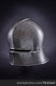 Iron helmet of the medieval knight. Very heavy headdress