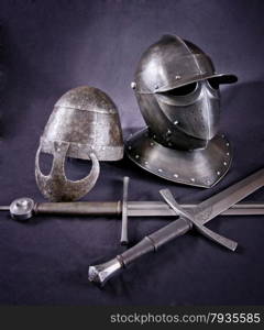 Iron helmet of the medieval knight. Very heavy headdress