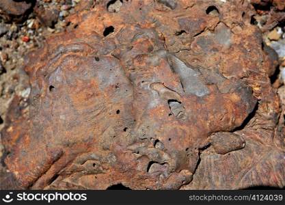 Iron rusty steel mineral stone macro detail in orange color