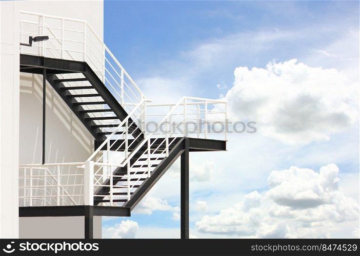 iron stairs blue sky . geometric steel pattern nature background.