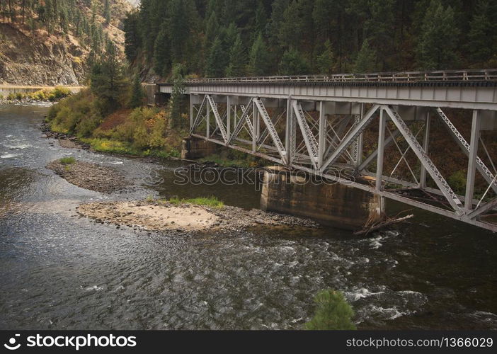 Iron Train Bridge Over Mountain River