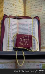 Islamic Holy Book Quran on the market shelf