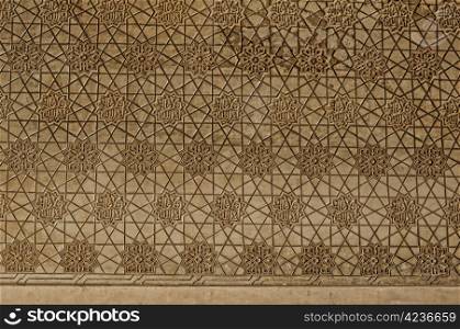 Islamic ornaments on a wall in an ancient castle