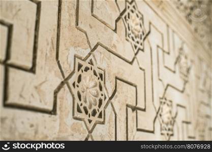 Islamic ornaments on wall. Arab symbols.