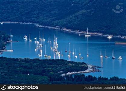 Island of Ilovik safe nautical harbor at dusk, Croatia