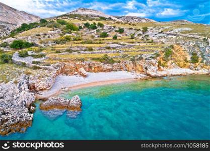 Island of Krk idyllic pebble beach with karst landscape, stone deserts of Stara Baska, Kvarner bay of Croatia