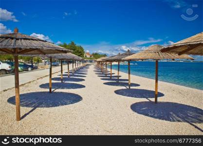 Island of Vir beach umbrellas, Dalmatia, croatia