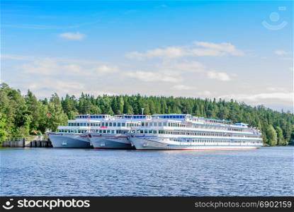 Island Valaam, Russia - September 6, 2017: Tourist boats moored at the pier on the island of Valaam. in Valaam, Russia