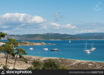 ISLAS CIES, VIGO, SPAIN - SEPTEMBER 16, 2017: View of the Playa de Rodas at Cies islands of Spain included in the Atlantic Islands of Galicia National Park.