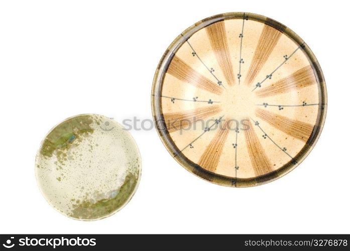 Isolated colorful pottery dish on white background, Chinese tranditional ware.