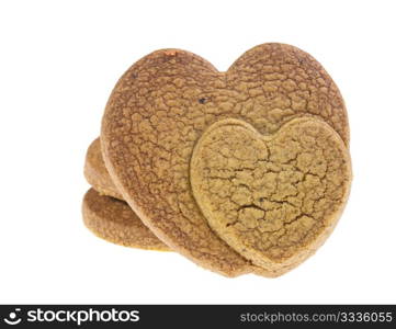 Isolated cookies with two connected heart pattern on white background. Made up of chocolate.