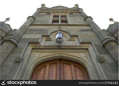 Isolated facade of the ancient castle on a background of the drama sky