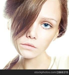 isolated fashion portrait of a beautiful young girl with blue eyes