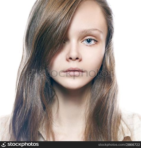 isolated fashion portrait of a beautiful young girl with blue eyes